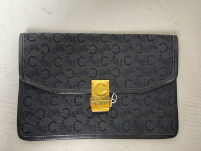 CELINE, Paris : pochette en tissu et cuir noir à décor du C …