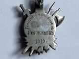 an image of a silver medal with the words hammerhead on it