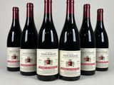six bouteilles de vin rouge alignées