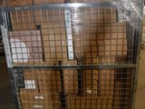 a cart full of boxes sitting in a warehouse
