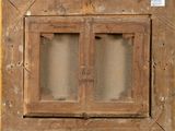 a picture of a wooden window with two glass panes