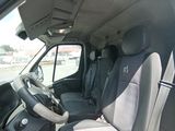 the interior of a van with the driver ' s seat folded down
