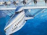 tableau représentant un avion survolant une étendue d'eau, avec une ville en arrière-plan