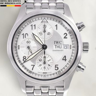 a close up of a wrist watch with a white dial