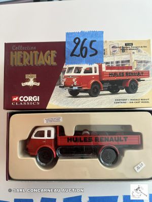un camion de pompiers rouge et noir dans une boîte