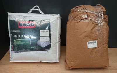 two bags of food sitting on a table next to each other
