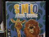 a box of smilo animal savages next to a video game