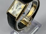 an image of a wrist watch with a black leather band