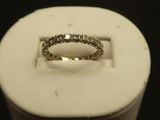 an image of a diamond ring in a white box