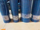 several stacks of blue plastic cups are stacked on top of each other