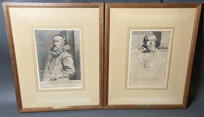 deux reproductions encadrées représentant un homme et une femme