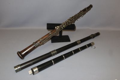 three different types of musical instruments sitting on a table
