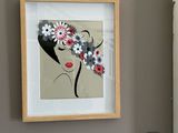 a picture of a picture of a woman with flowers in her hair