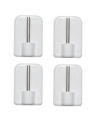 four white plastic wall hooks with a metal bar on each side