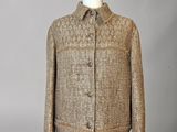 a brown jacket on a mannequin mannequin stand