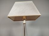 a lamp that is on a table in a room