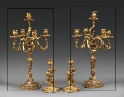 three different views of a gold colored candelab with three candles