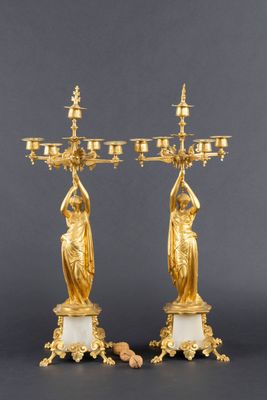 a pair of gilded bronze and marble candelabs