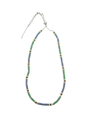a blue and green beaded necklace on a white background