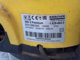 the back end of a yellow machine with a barcode on it