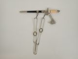 a pair of scissors and a pair of scissors hanging on a hook