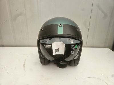 an image of a helmet on a table with a tag on it