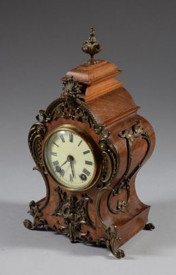 a small clock that is sitting on a table
