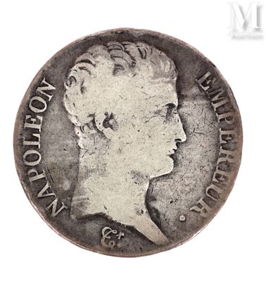 an old silver coin with a woman ' s profile on it