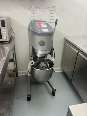an image of a kitchen with a mixer and other appliances
