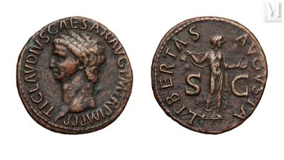 an old coin with the image of a woman holding a sword