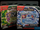 two packs of pokemon cards on display in a store