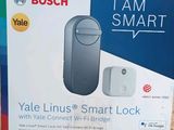 packaging for a smart device with a smart lock inside of it