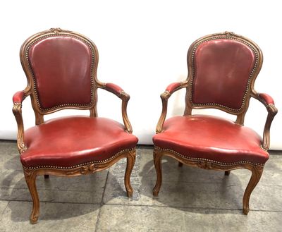 pair of red leather chairs