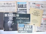 a lot of newspapers on a table with a bunch of them