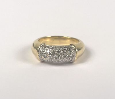 a close up of a gold and diamond ring on a white background