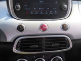 the dashboard of a car with a steering wheel and dashboard controls