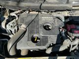 a picture of a car engine with its hood open