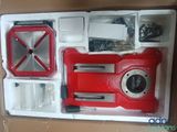 a picture of a red and white box with a red camera