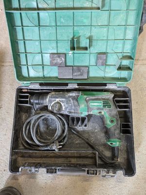 a tool in the case that is sitting on the floor