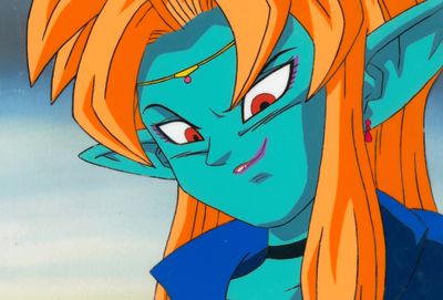 un gros plan sur un personnage de dessin animé aux longs cheveux blonds et aux yeux bleus