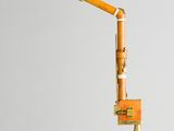 a wooden desk lamp that has a pencil on top of it