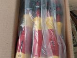 a box of toothbrushes that are wrapped in plastic