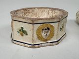 a small bowl with a picture of a woman on it