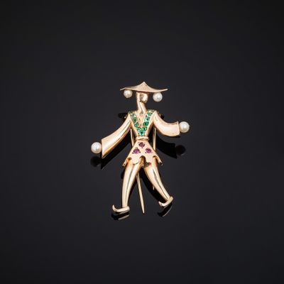 Broche « Arlequin » en or jaune 585°°° figurant un personnag…
