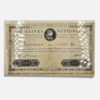 un ancien billet de banque sur lequel figure le portrait d'une femme