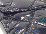 chanel black quilted quilted purse with gold logo