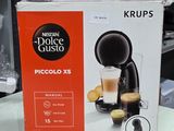 packaging of a coffee machine sitting on a counter in a store