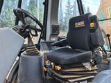 a picture of a tractor with a seat and a steering