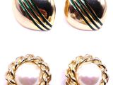 three pairs of gold and pearl earrings and a ring