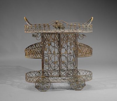 Desserte à roulette en fer forgé à patine verte de forme obl… - Photo 1